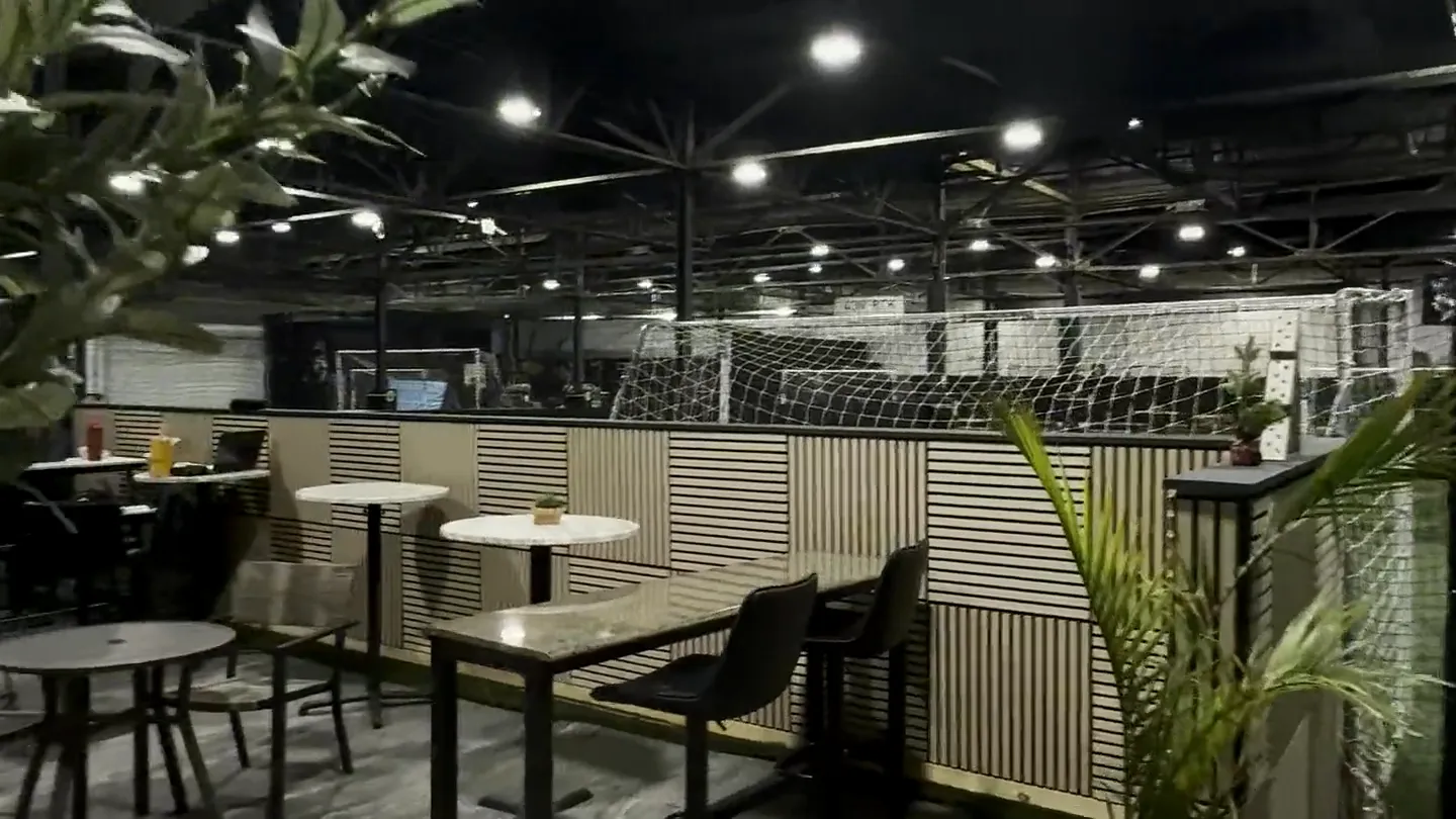The Wolfden lounge and turf field set up for an event